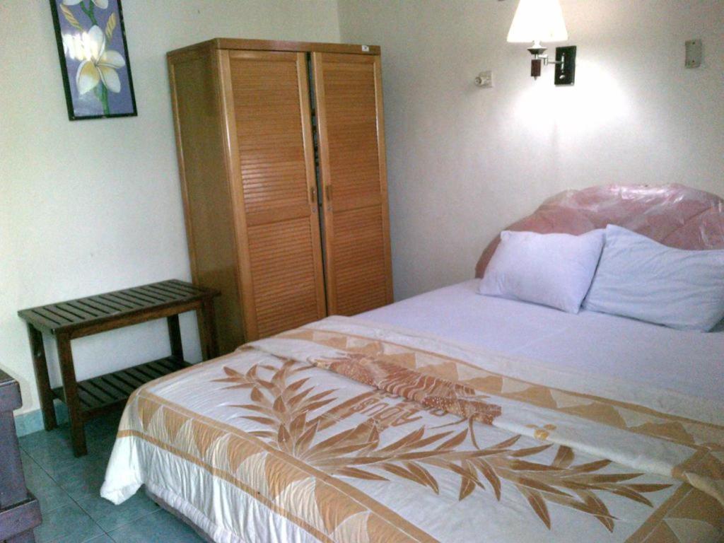 Adus Beach Inn Legian Pokoj fotografie