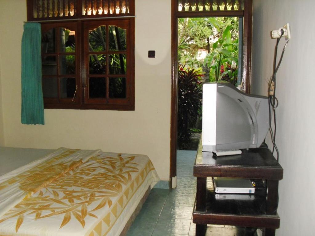 Adus Beach Inn Legian Pokoj fotografie